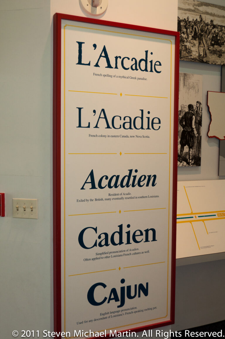An interpretive panel displays the terms L’Acadie, L’Acadien, Acadien, and Cajun in large type.