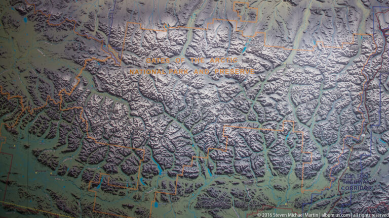 A shaded relief map labels Gates of the Arctic National Park and Preserve across rugged mountain terrain.