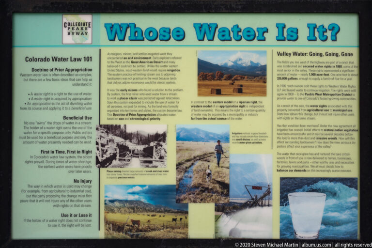 A “Whose Water Is It?” wayside panel presents Colorado water law beside photographs of irrigation, farms, and river use.