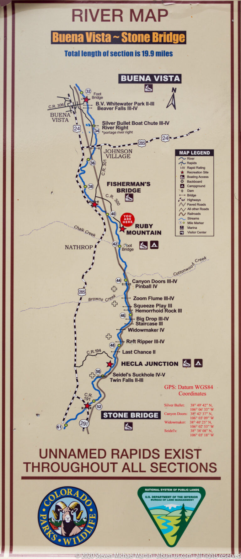 A river route map marks the Arkansas River, roads, access points, rapids, and a “You are here” point near Ruby Mountain.