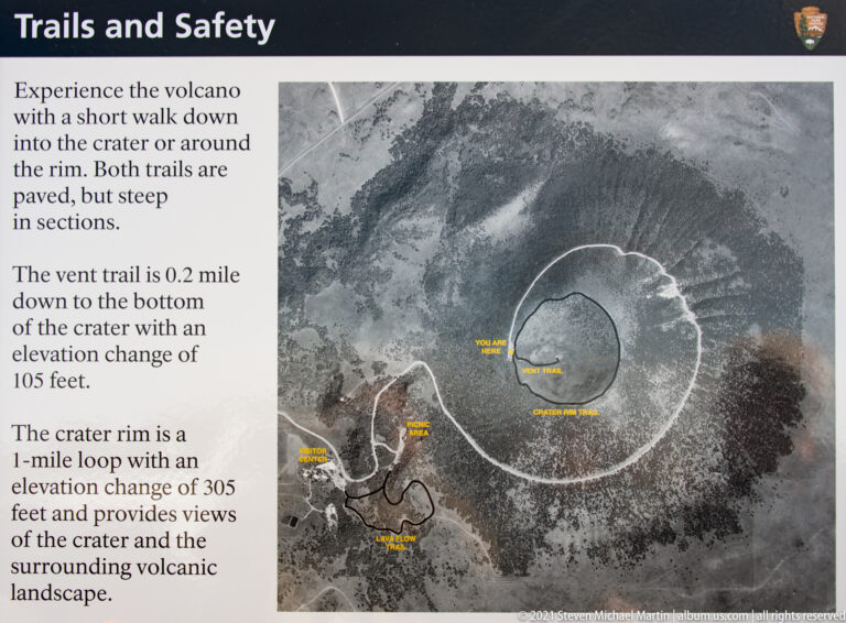 An aerial map outlines a loop around the crater and a shorter trail descending to the vent.