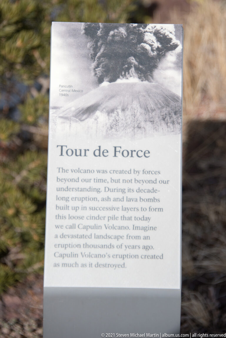 A park sign titled “Tour de Force” shows an old volcano photograph above text about Capulin’s eruption.