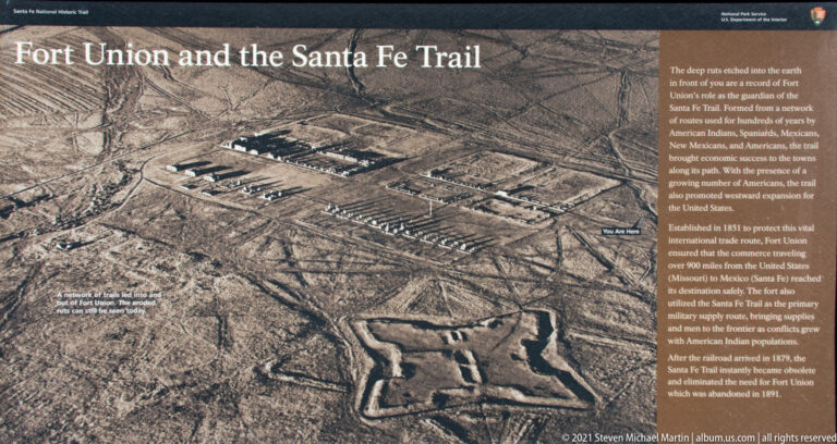 Interpretive panel with an aerial photograph of Fort Union’s rectangular compounds and text about the Santa Fe Trail.