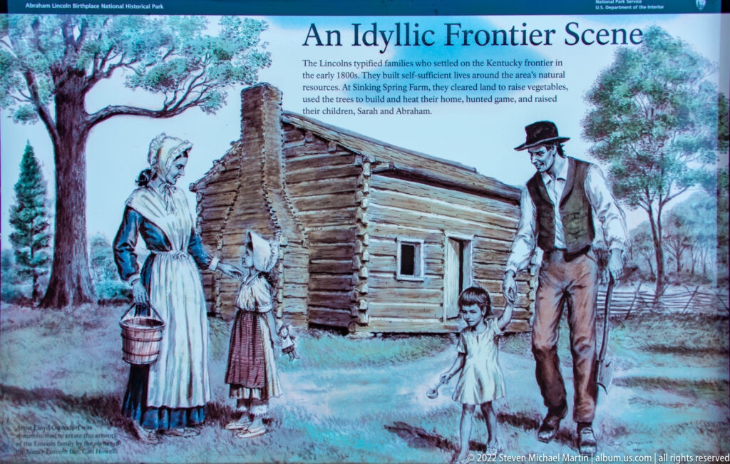 An exhibit illustration shows a family outside a log cabin, with interpretive text above.