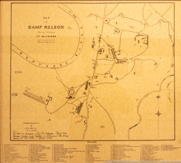 A tan map shows the Camp Nelson area, with a river bend, roads, structures, and a small legend.