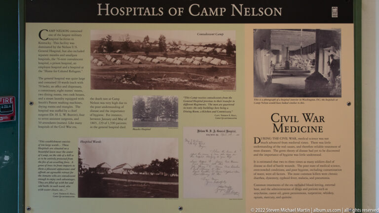 An interpretive panel about Camp Nelson hospitals fills the frame, with archival photographs and text arranged beneath its heading.