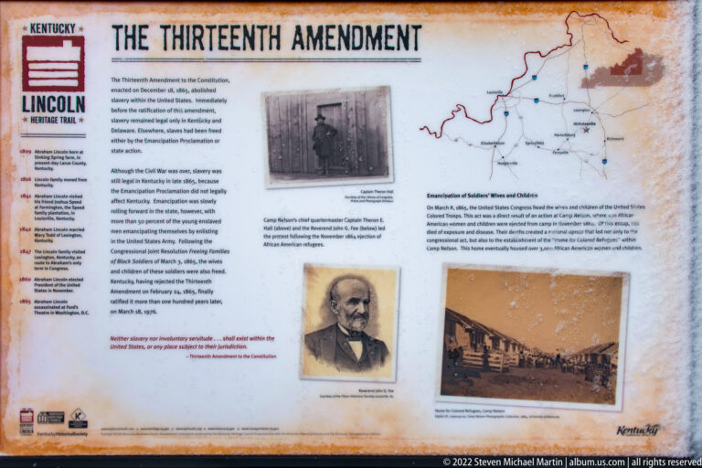 A Thirteenth Amendment exhibit panel combines explanatory text, a map, portraits, and a historical camp photograph.