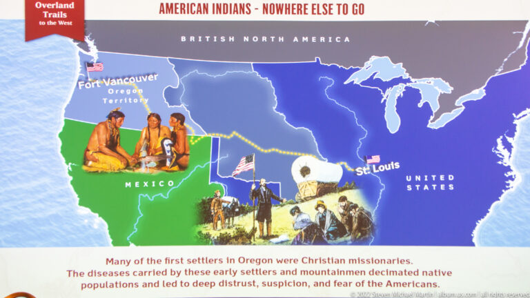 A North America map with colored territories and illustrations appears above text about American Indian displacement.