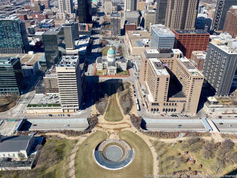 An aerial view centers the domed Old Courthouse among downtown buildings and landscaped grounds.
