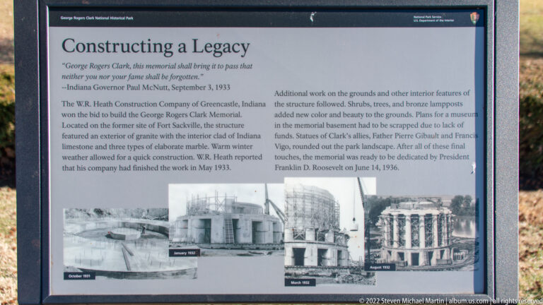 A Building a Legacy panel combines construction photographs and text about the memorial.