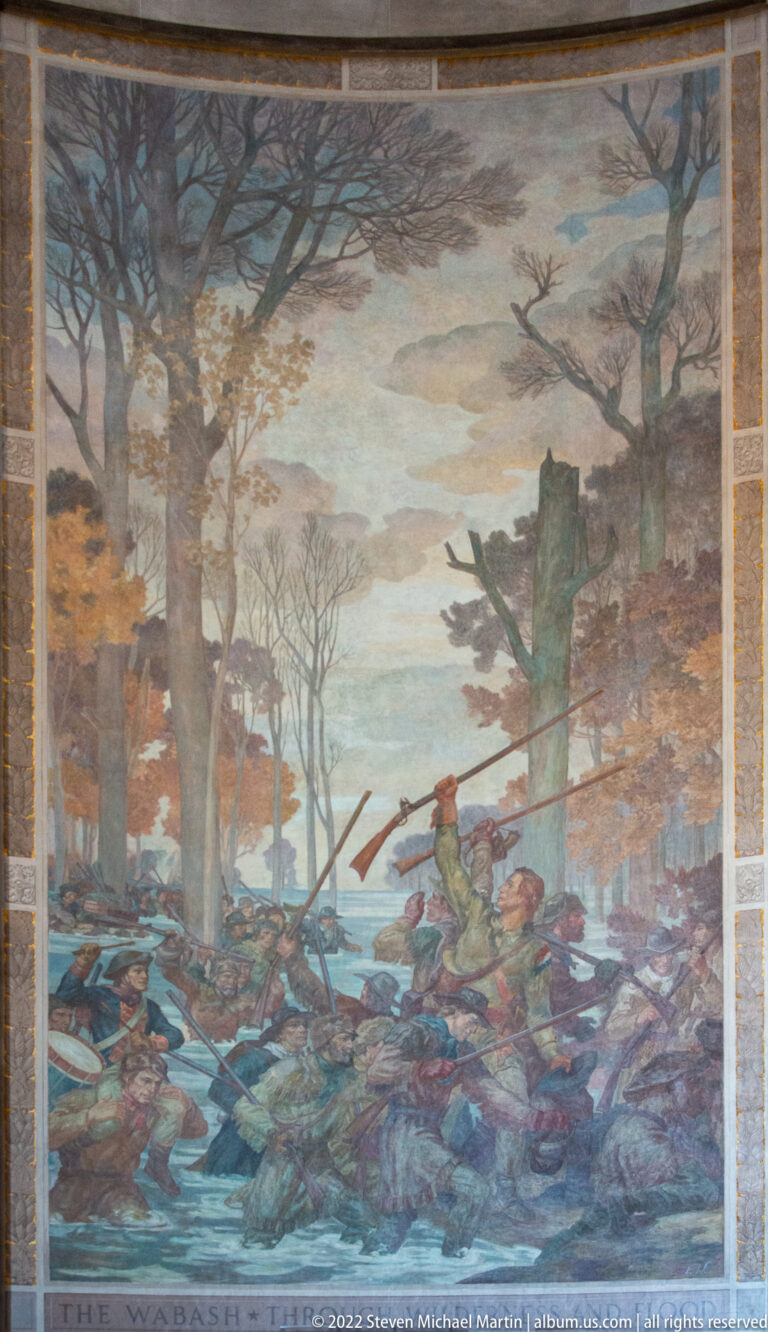 Mural labeled “The Wabash” shows armed figures and a canoe among debris beside a river.