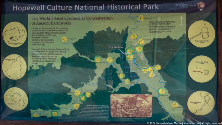 A green regional map marks earthwork sites and includes circular diagrams and a You are here marker.