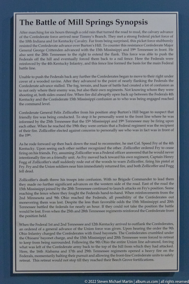 Framed text panel titled “Battle of Mill Springs Synopsis” mounted on a blue gallery wall.