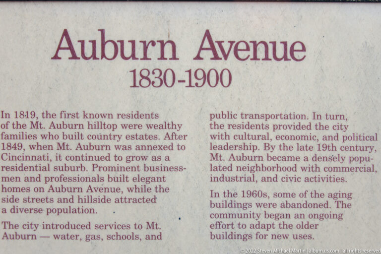 A close view of the Auburn Avenue panel shows text, archival photographs, and house elevations.