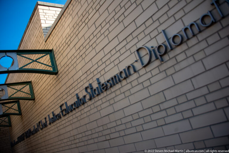 Raised letters spell William Howard Taft National Historic Site across a pale brick wall.