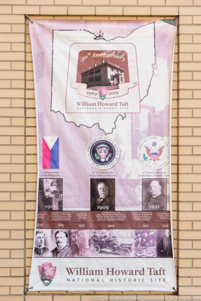 A commemorative banner combines a Taft home photograph, Ohio map, presidential seal, and archival images.
