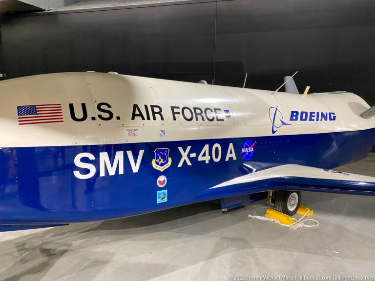 The X-40A’s white-and-blue side displays U.S. Air Force, Boeing, and SMV lettering.