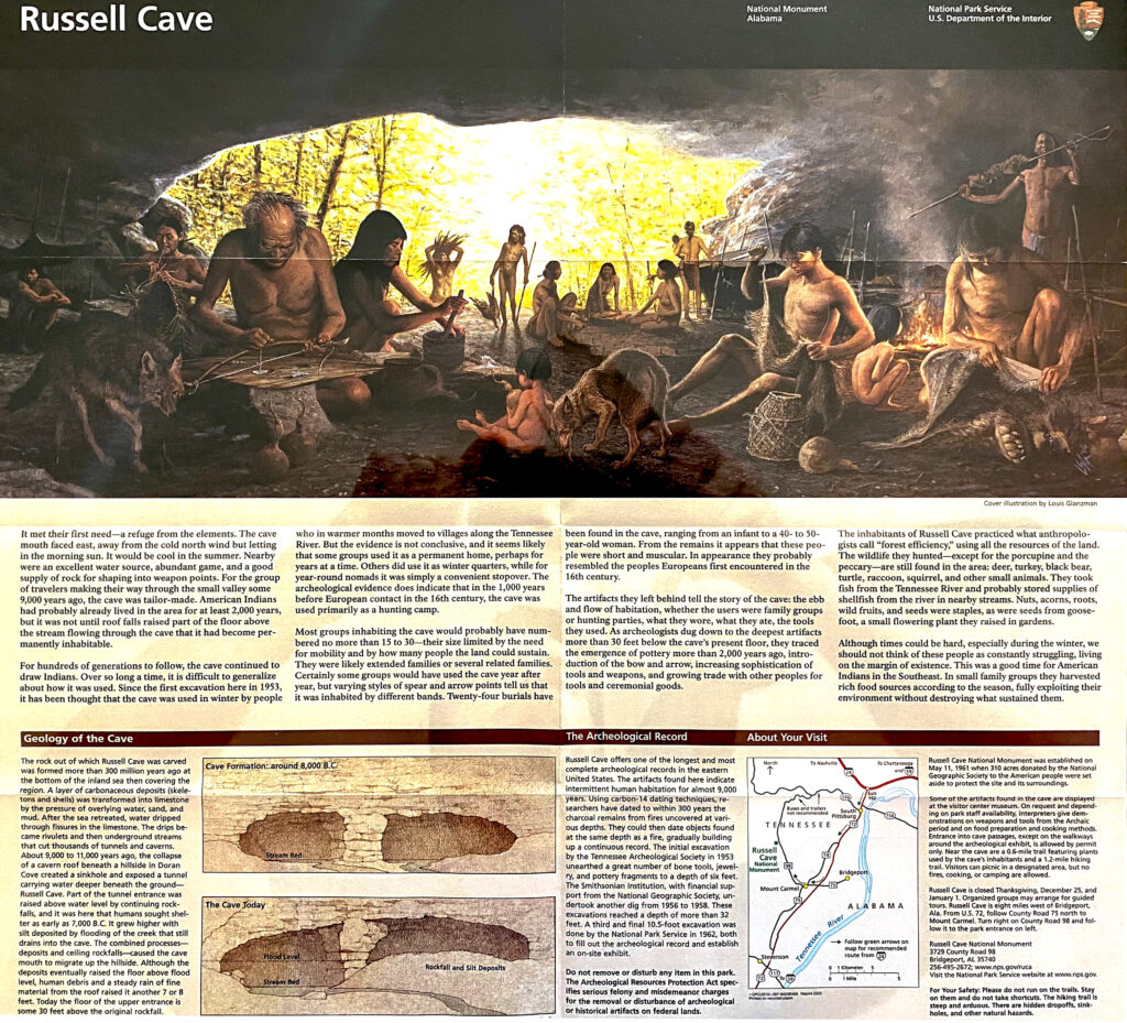 A Russell Cave exhibit panel combines a painted cave scene, explanatory text, diagrams, and maps.