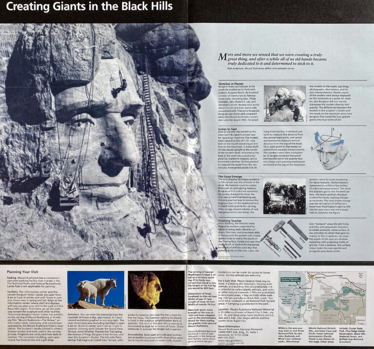 An interpretive spread titled “Creating Giants in the Black Hills” shows carving photographs, diagrams, text, and a map.