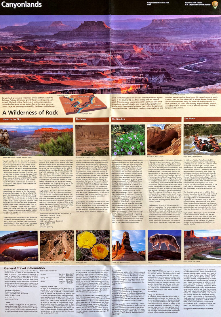 An open Canyonlands National Park brochure shows a panoramic image above small photos and columns of text.