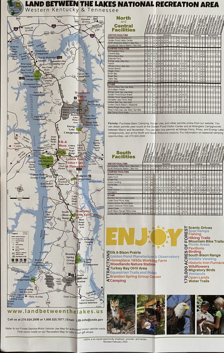 A foldout map shows Land Between the Lakes between two lakes, with facility tables and recreation notes.
