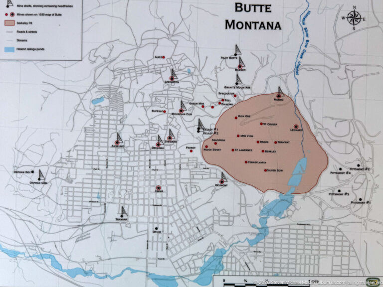 Map of Butte, Montana, with the Berkeley Pit shaded on the east side and numerous mine symbols across the city.