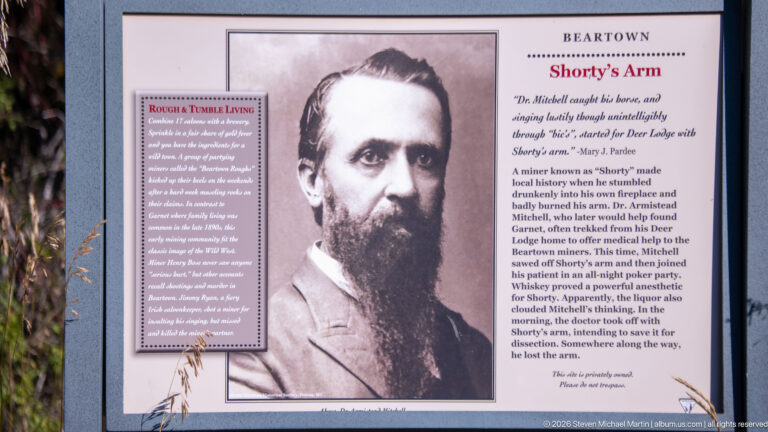 Beartown interpretive panel titled Shorty’s Arm, featuring a black-and-white portrait and historical text.