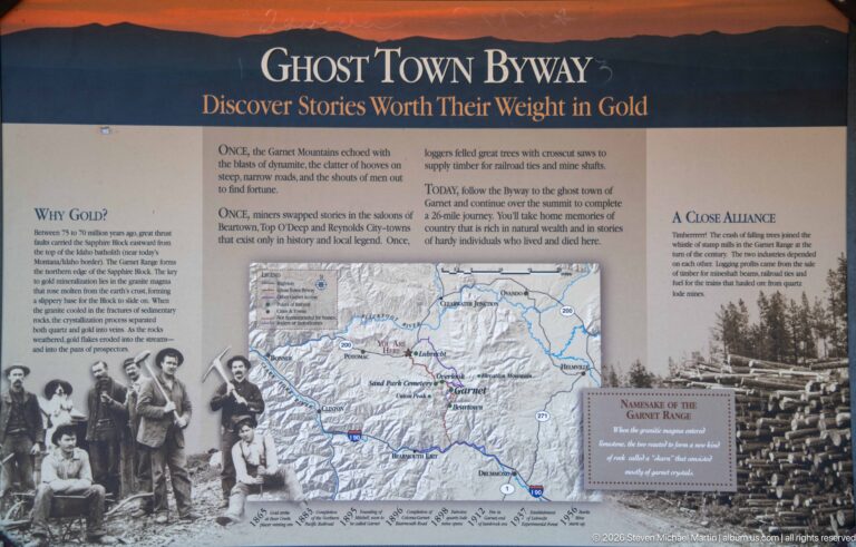 Ghost Town Byway interpretive panel with regional route map, historic group photographs, mining history, and a logging or settlement image.