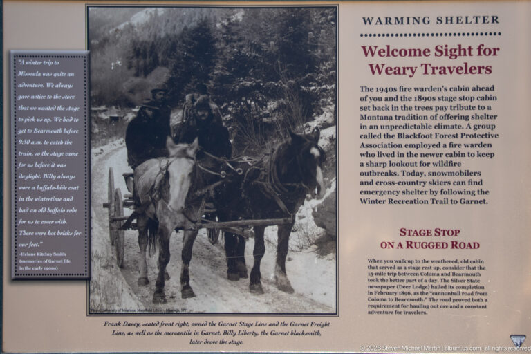 Warming Shelter interpretive panel with historic photograph of a horse-drawn sleigh and text about winter travel to Garnet.