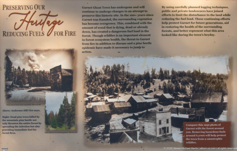 Reducing Fuels for Fire interpretive panel with historic Garnet photographs and text about thinning vegetation to reduce wildfire risk.